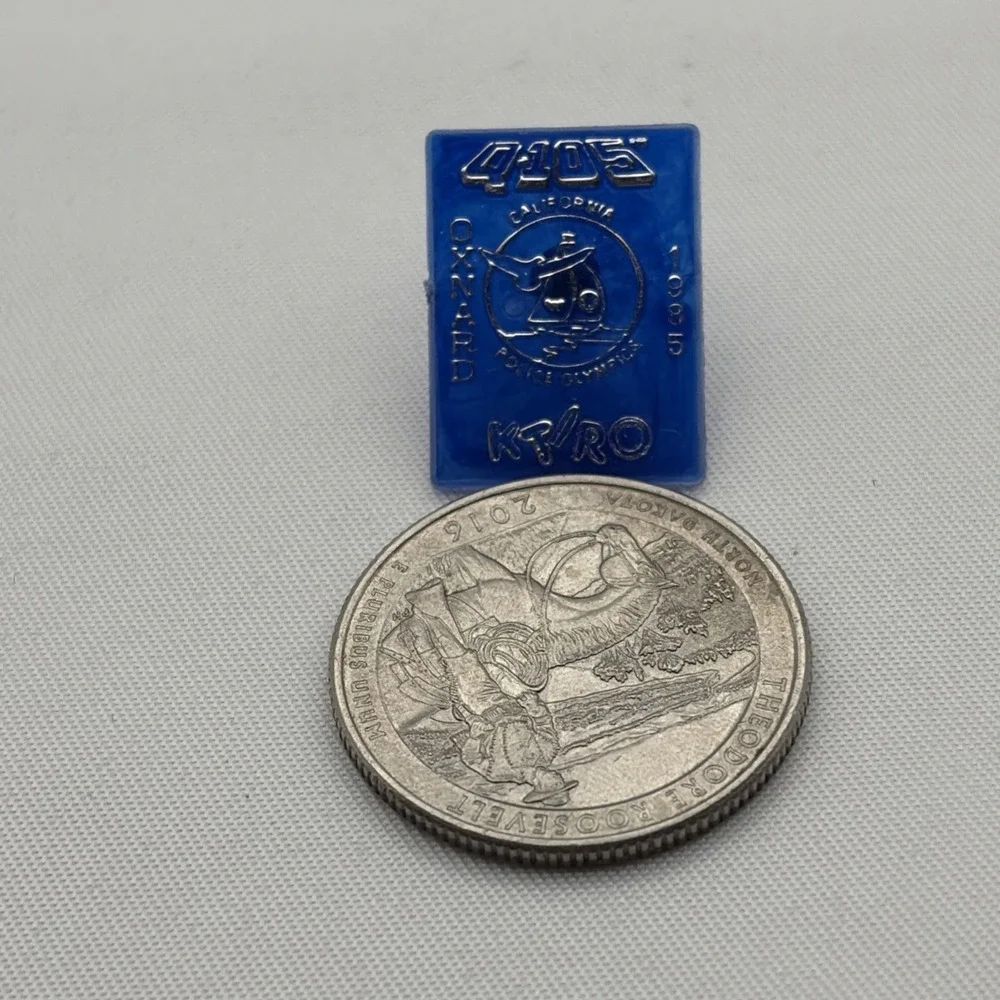 1985 Oxnard California Police Olympics Q-105 KT/RO Radio Plastic Lapel Hat Pin